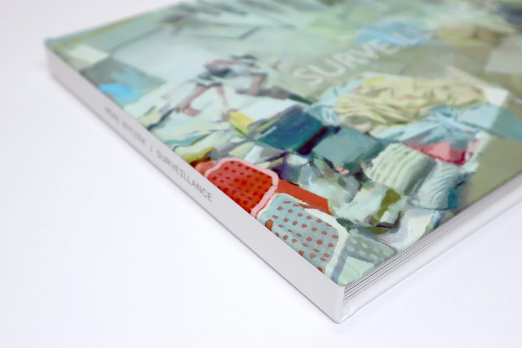 Close up view of spine on "Surveillance" book