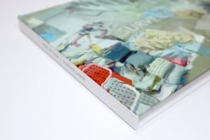 Close up view of spine on "Surveillance" book